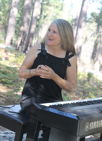 Image of pianist Karen Rhoads at Boggs Mountain Demonstration State Forest